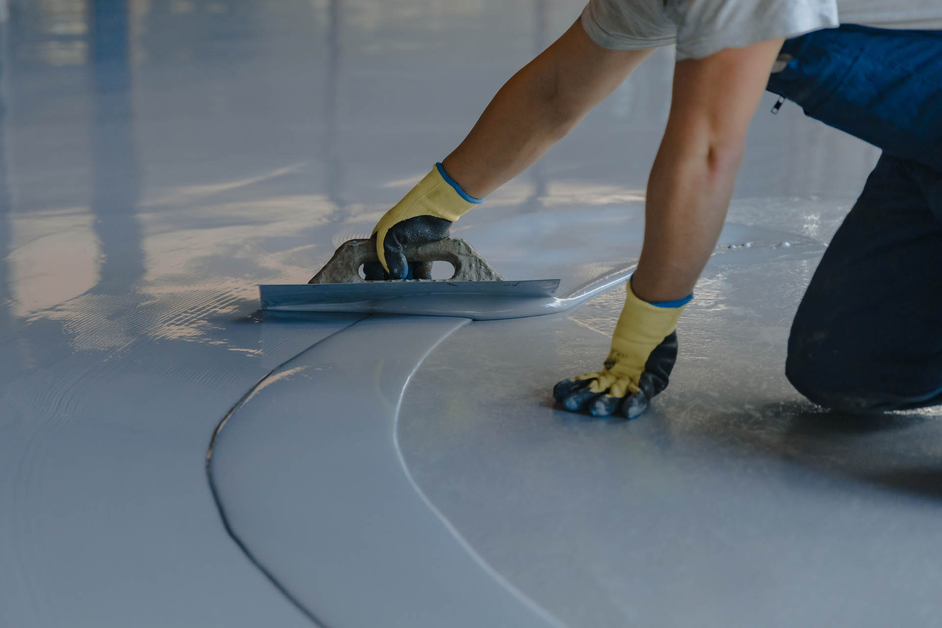 man performing flooring services